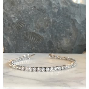 TENNISARMBND i 18 kt guld & 8.00 ct. diamanter