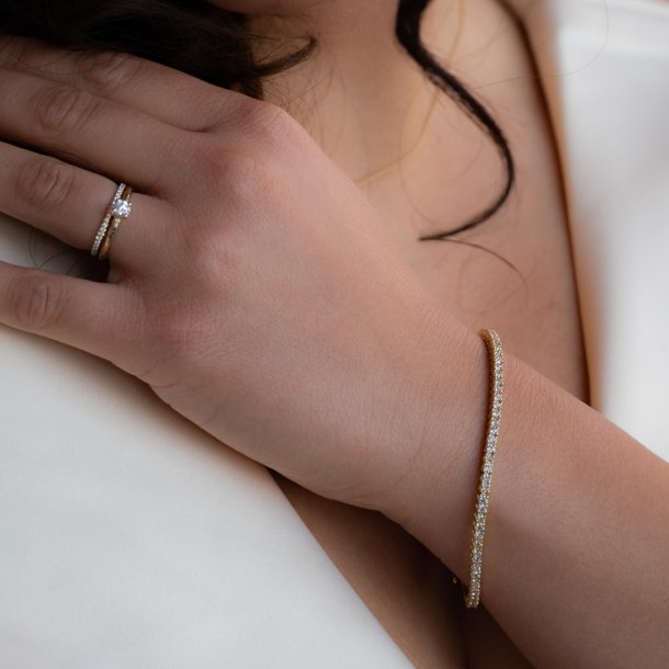 TENNISARMB�ND i 18 kt guld &amp; 3.00 ct. diamanter
