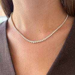 TENNISCOLLIER i guld med 5.69 ct.