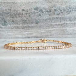 TENNISARMBND i 18 kt guld &amp; 5.00 ct. diamanter