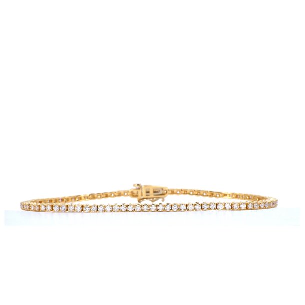 Tennisarmb�nd i guld 1 carat diamanter
